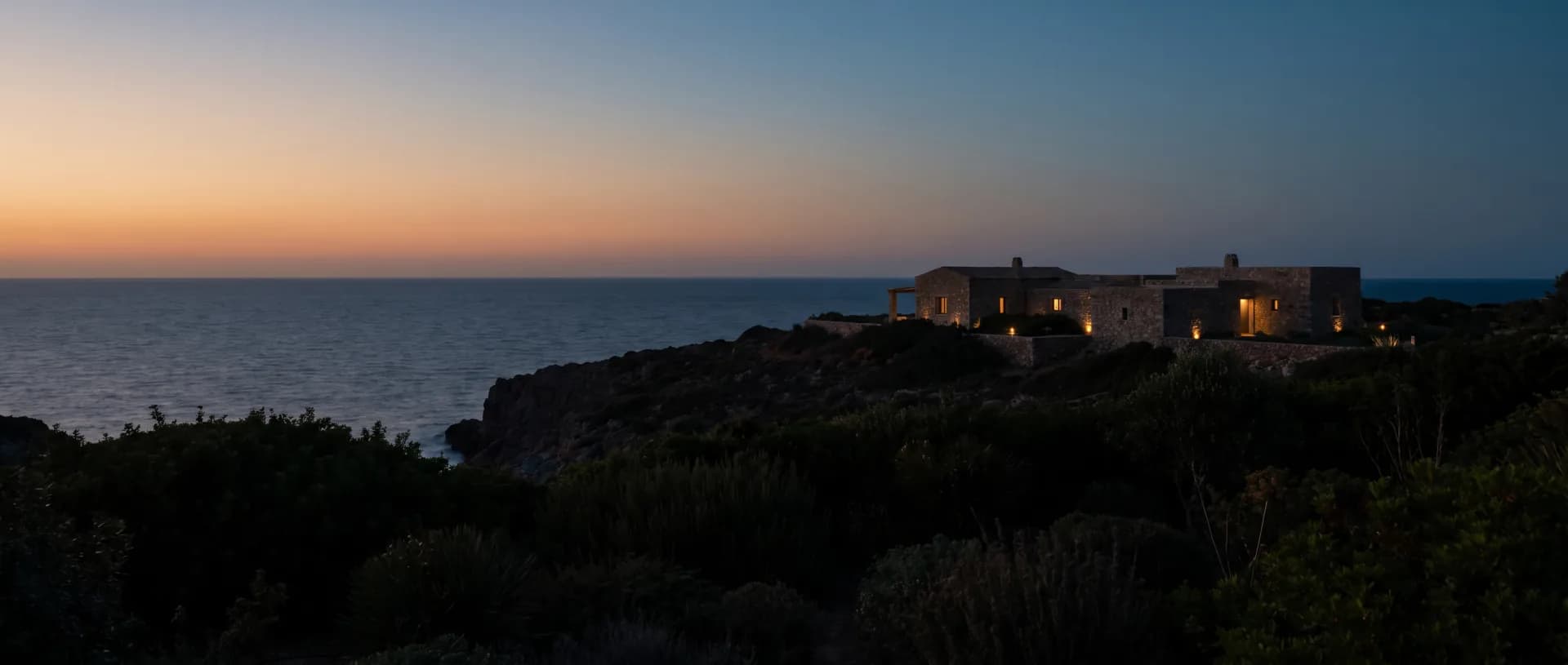 A quiet estate above the sea at twilight